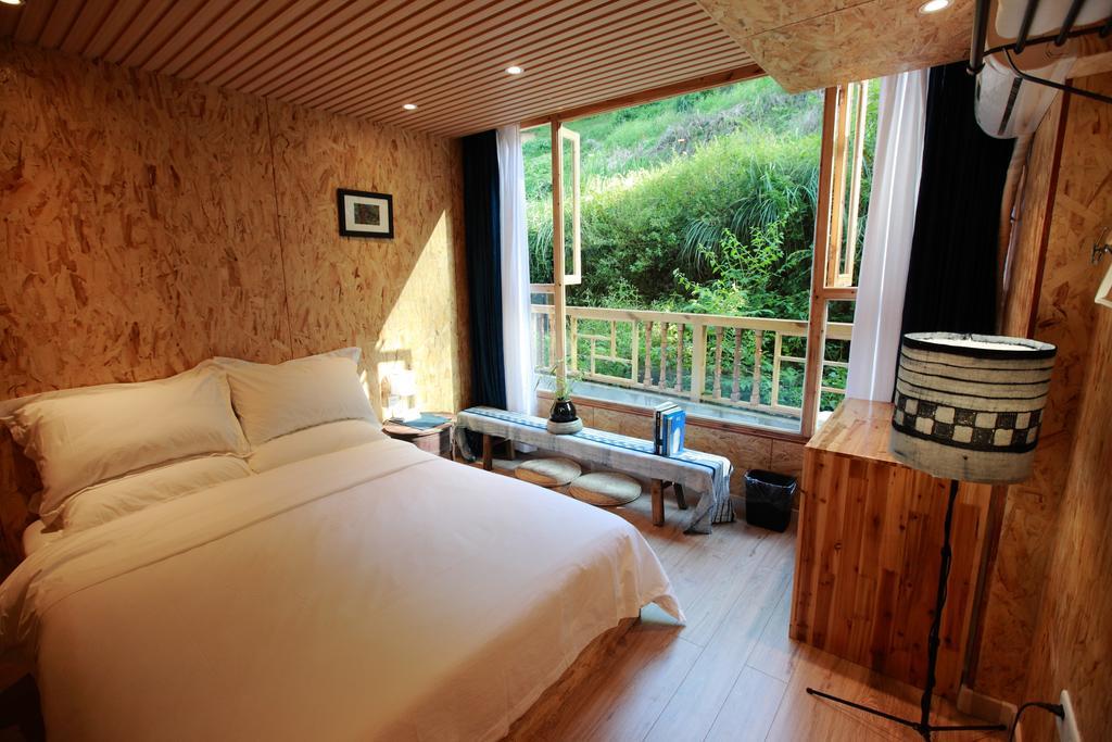 Tong Sang Art Hotel Liping Værelse billede