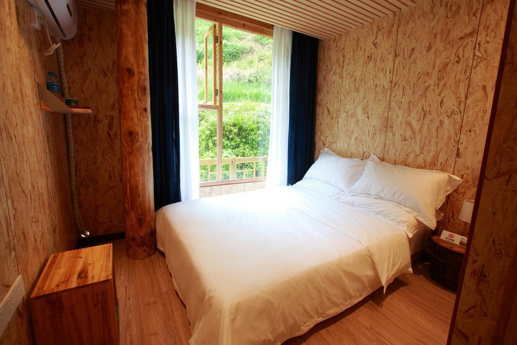Tong Sang Art Hotel Liping Værelse billede