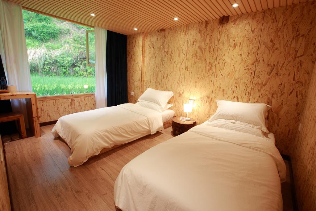 Tong Sang Art Hotel Liping Værelse billede