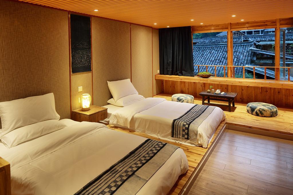 Tong Sang Art Hotel Liping Eksteriør billede